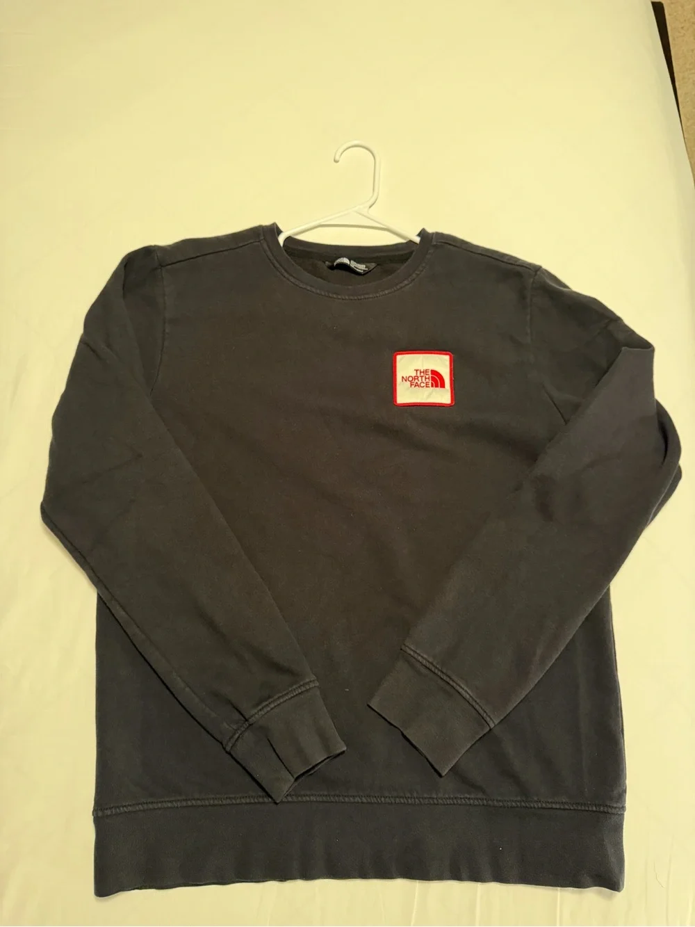 The North Face Men's Crewneck Sweatshirt in Charcoal with Red Logo Patch